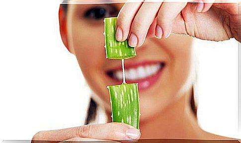 Woman using aloe vera gel