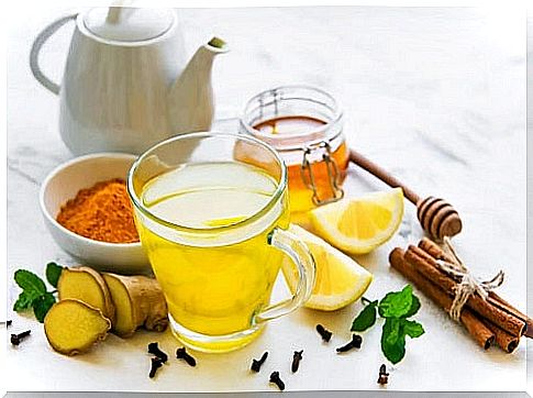 Cup with turmeric remedy with honey