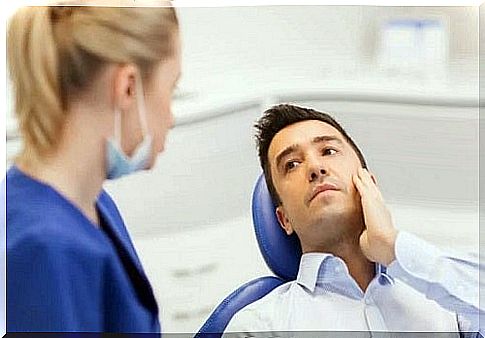 Man at the dentist with toothache