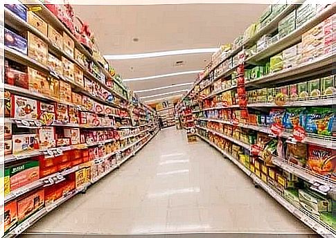 Supermarket shelves full of food