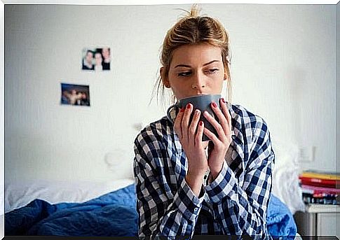 Girl drinking hot tea