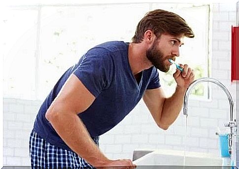 Man applying trench mouth treatment