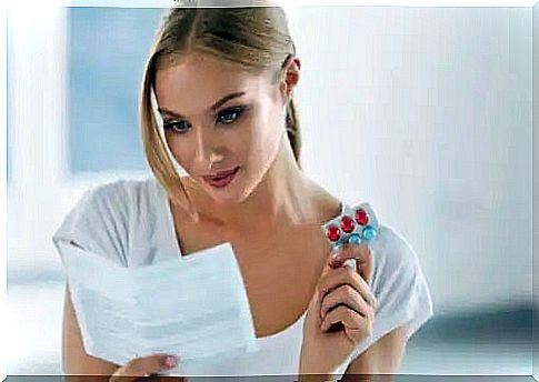 Young woman reading about drug storage